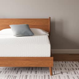 Ashley Chime memory foam mattress styled in a neutral bedroom
